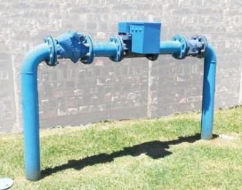 A typical large-volume water meter, retrofitted for automated readings